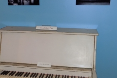 Honey Hudgen's 3/4-size piano in exhibit