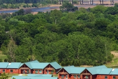 Aerial photo of current Tulsa Boys Home with Tulsa city skyline;